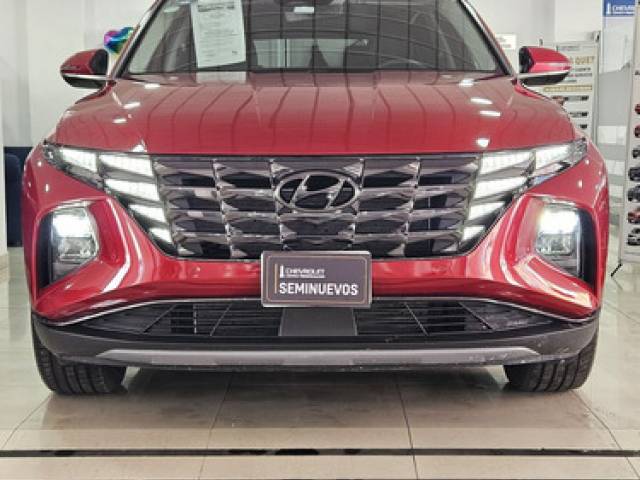 Hyundai Tucson 2.4 Limited Tech At SUV rojo gasolina $599.900